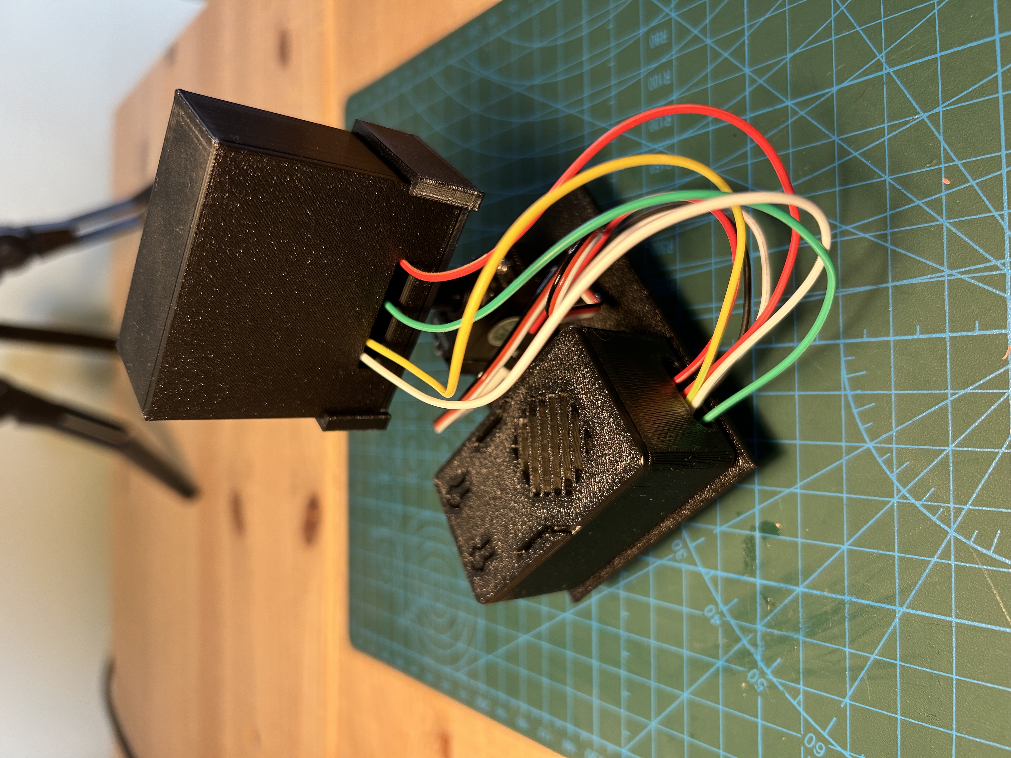 ESP32 casing can be closed and contains reset buttons.
